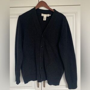 Men’s black wool snap button sweater.